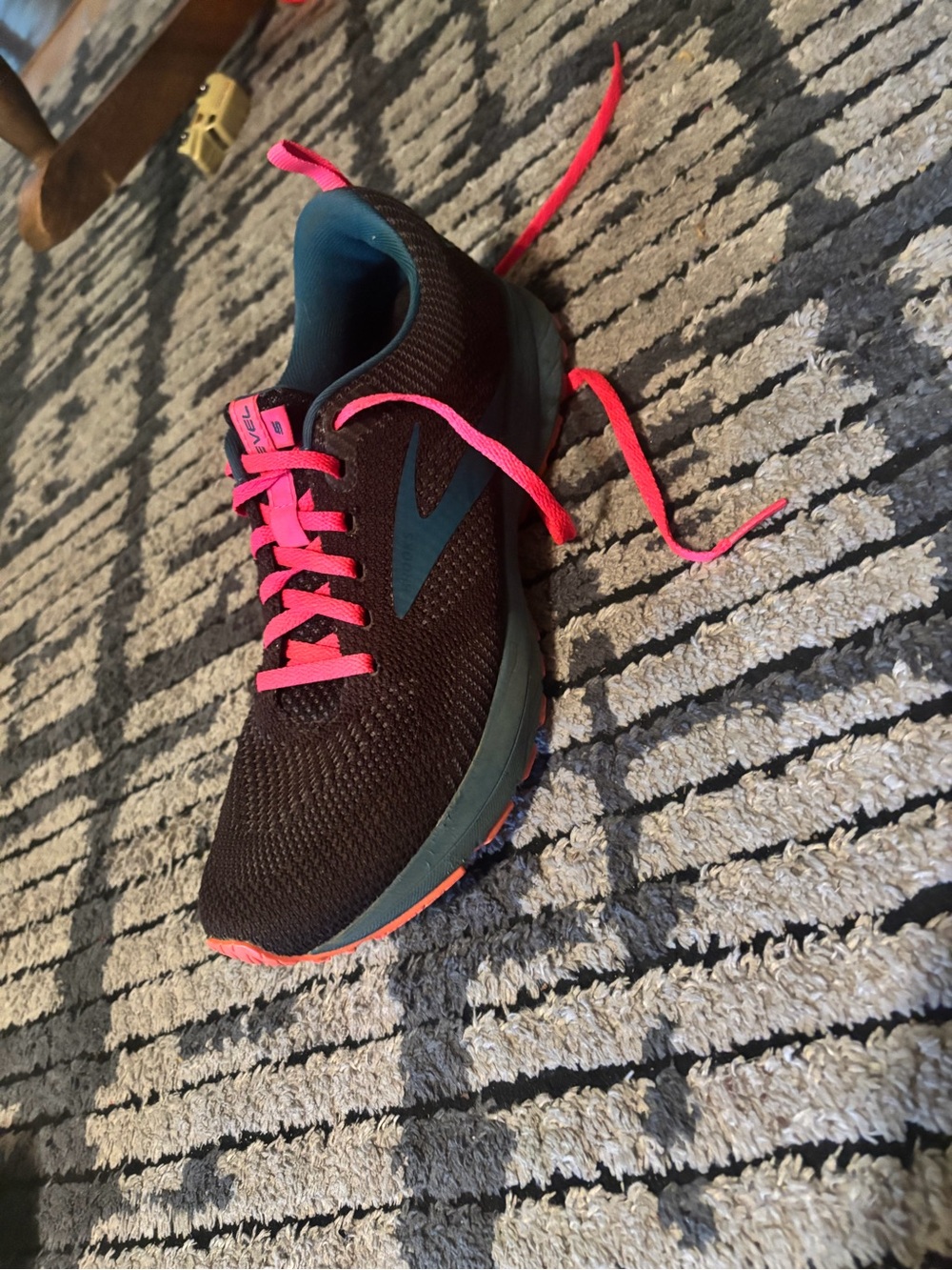 Brooks Women's Black Running Shoe with Pink Laces and Teal Accents